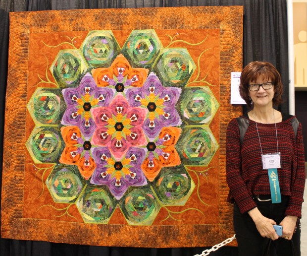 Cory and her show-stopping collaboration quilt, "Lilypad". Pieced by Patti Van Oordt