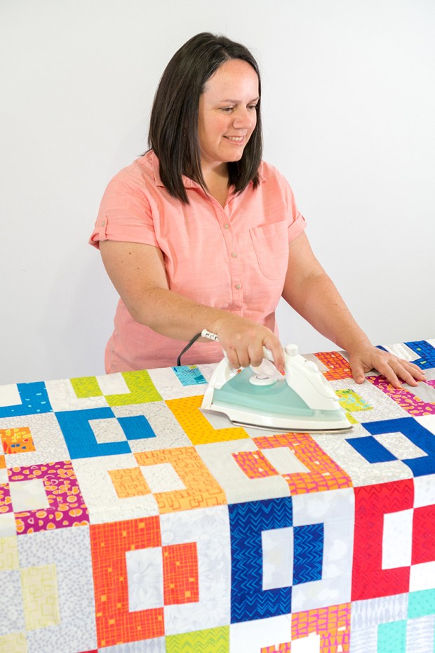 Press the spray basted quilt