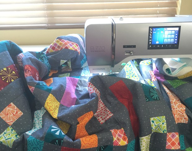 Scrunch and Smoosh the quilt under the machine