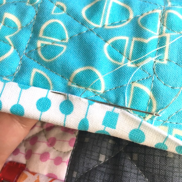 Hand Stitch the binding